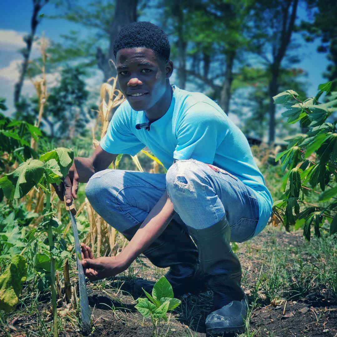 A SAKALA youth standing in a field